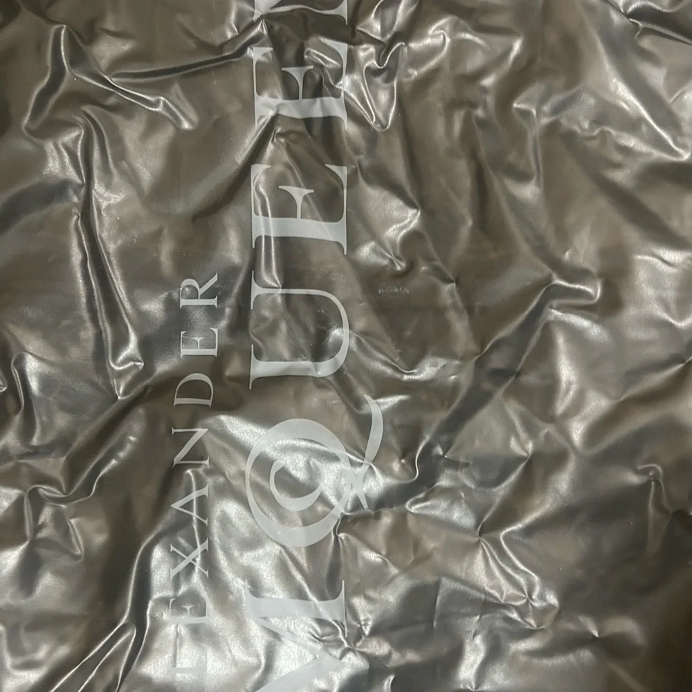 Vinyl garment bag Alexander McQueen